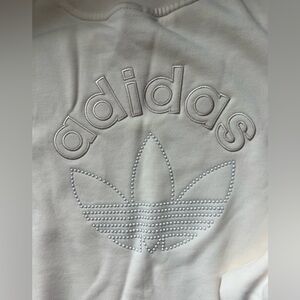 Adidas pullover with pearl detailing. Like new.